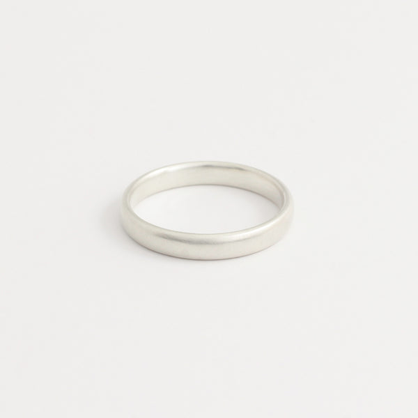 Matte white gold wedding ring, inner edge view, rounded 3mm width